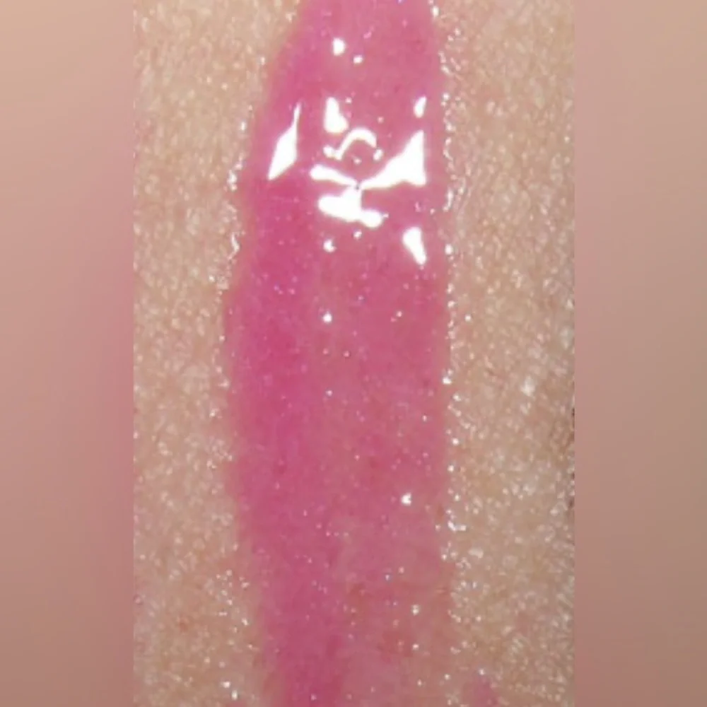 MAC REVENGE IS SWEET LIPGLASS. LIMITED EDITION. NEW IN BOX.